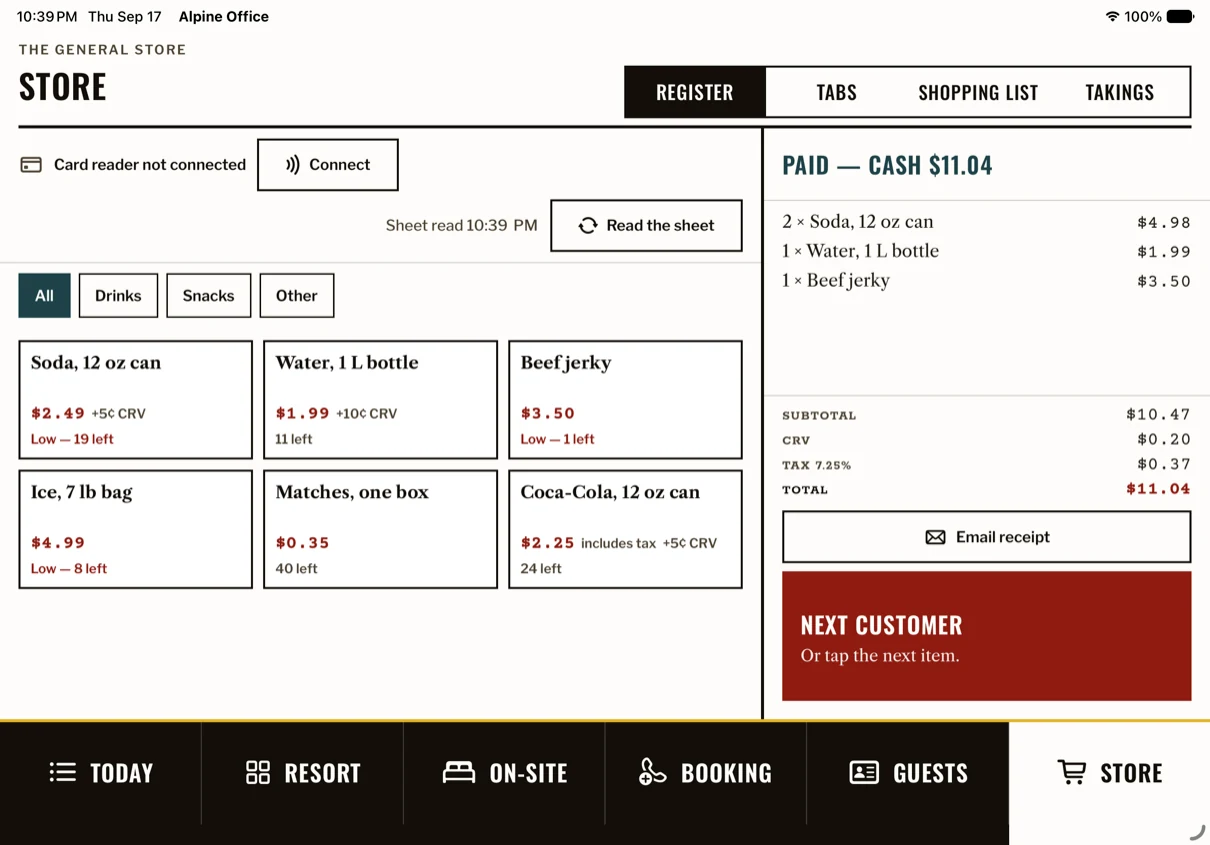 The store register on the iPad: the catalog on the left, a paid cart on the right, and buttons for cash, card and guest tab.